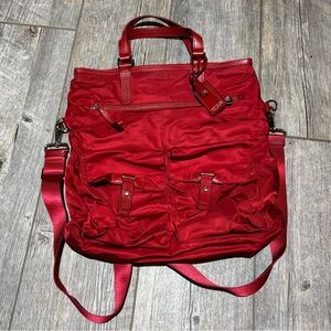 Tumi Red Flight Bag